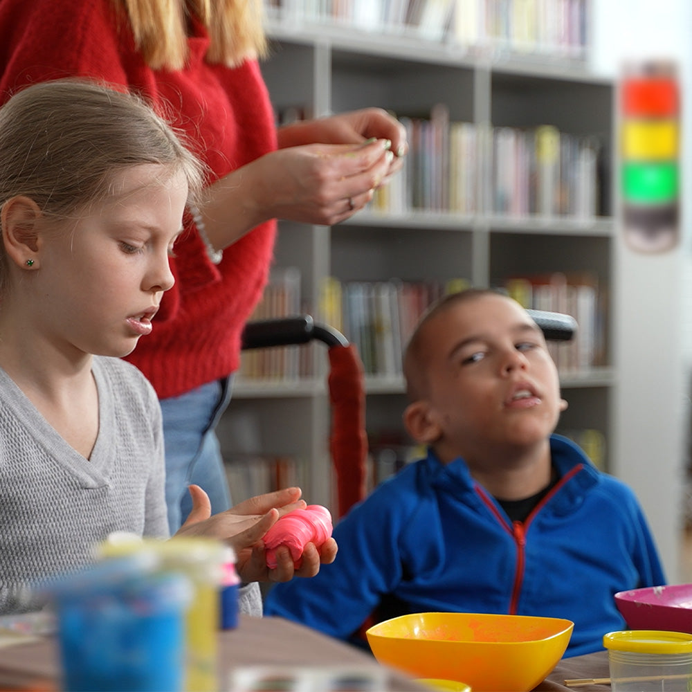 An Alertz® device reduces noise levels in various settings like classrooms and libraries. It uses a traffic light system: green for acceptable, amber for rising noise, and red for too noisy. Options include lights only, lights with a siren, or lights with chatter tracker, yacker tracker, betzold, eduk8, eduk8 worldwide, teacher, pupils, students, teaching resources, teaching supplies, classroom resources, classroom supplies, school resources, school supplies, ks1, ks2, reception, primary school, special ne