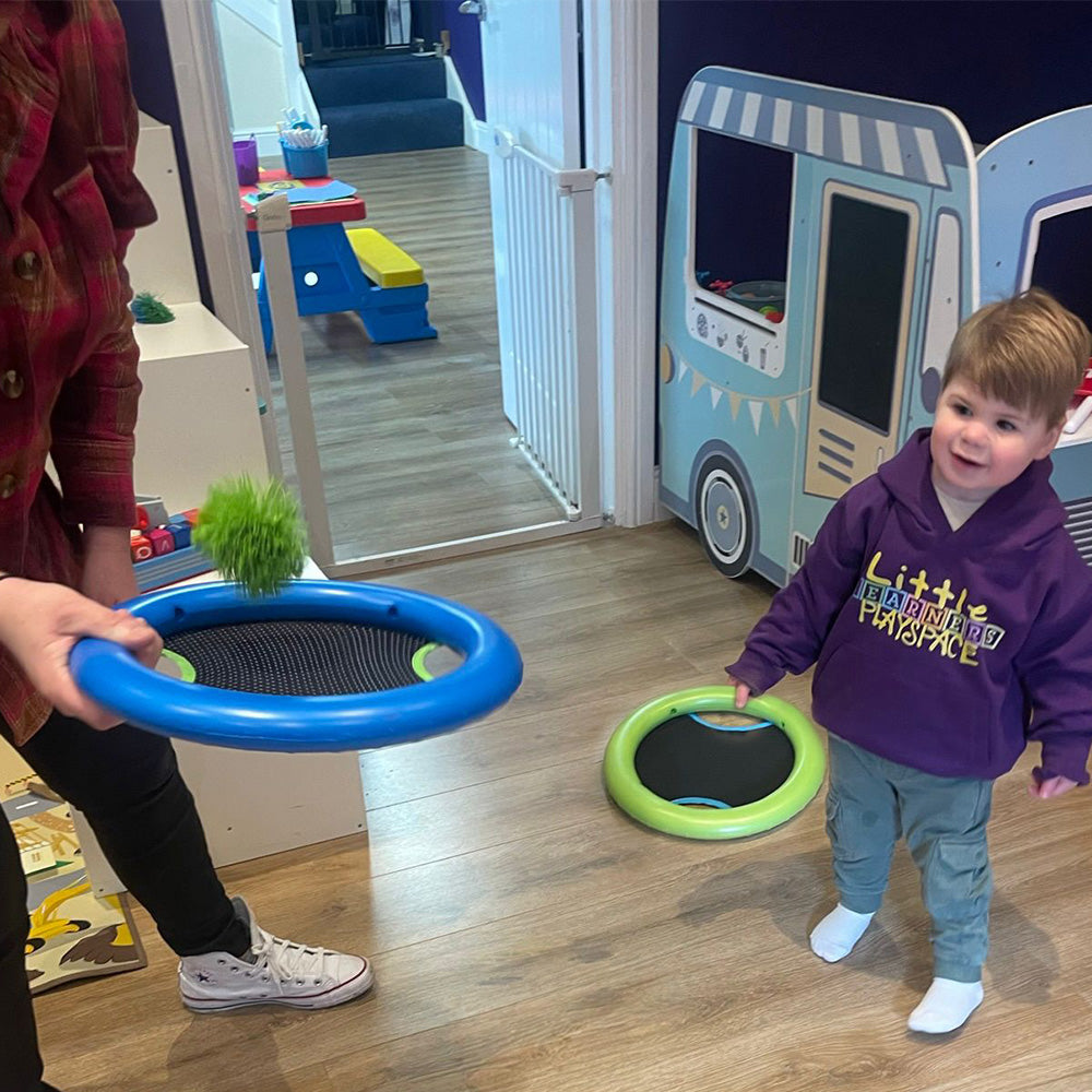 AWARD WINNING Bounce ‘n’ Catch Discs bat and ball game for indoor or outdoor play. Two-colored discs with hand holes for grip and a springy middle. Can be used as throwing and catching discs or for bouncing skills with the included rubber ball. Versatile 