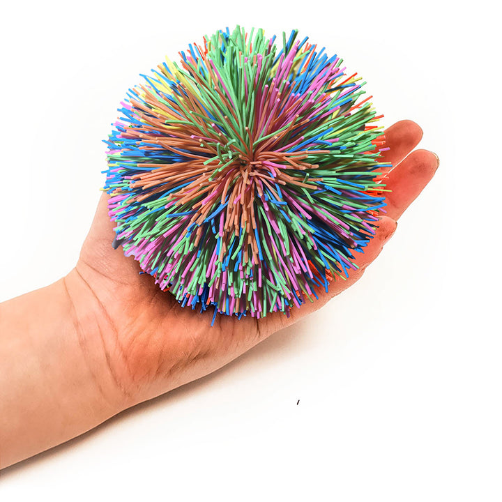 versatile Fuzzee Koosh furry rubbery soft balls, perfect for use with a variety of sports or on their own. outdoor learning and sen. Suitable for both indoor and outdoor use. with header card mulitcoloured 