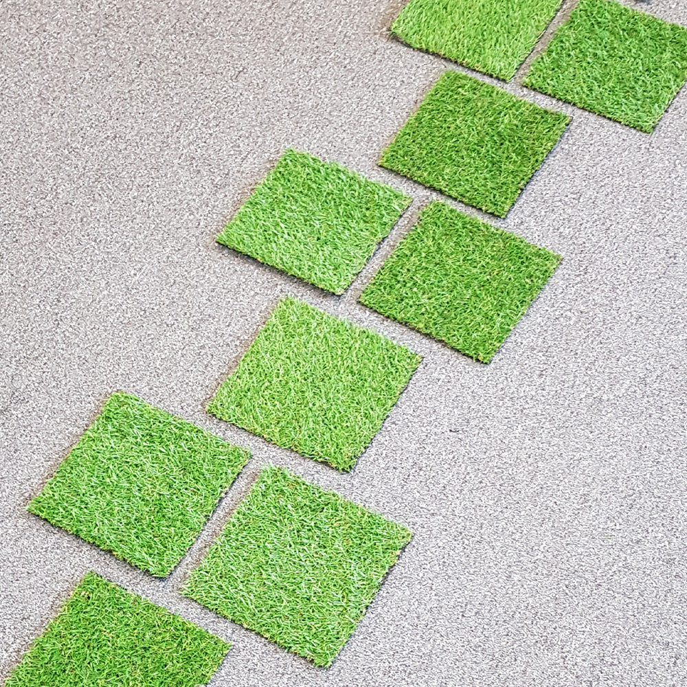 Artificial, durable grass shapes suitable for indoor or outdoor use. Children can enjoy the sensorial experience while learning about shape, counting, and size. 20 x 20cm HOPSCOTCH