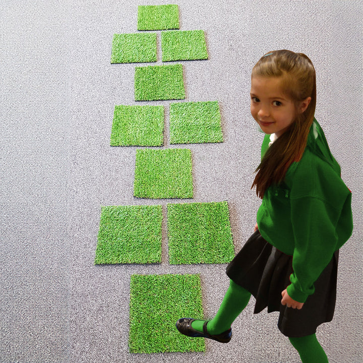 Artificial, durable grass shapes suitable for indoor or outdoor use. Children can enjoy the sensorial experience while learning about shape, counting, and size. 20 x 20cm HOPSCOTCH