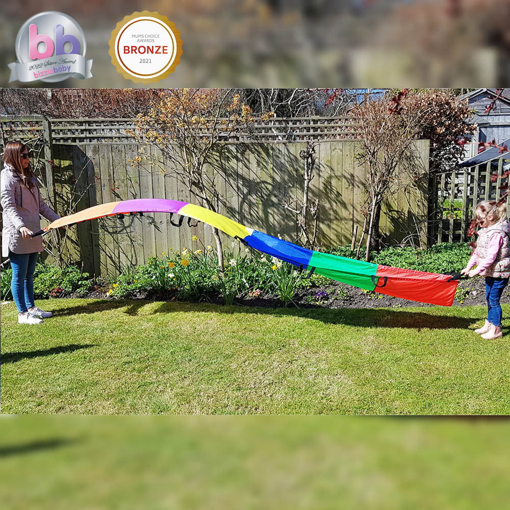 Award-winning Rainbow Wave designed for group participation, accommodating 9-18 children of all ages and abilities. Promotes social and teamwork skills, color identification, estimation, and probability. Encourages physical exercise and develops coordinat