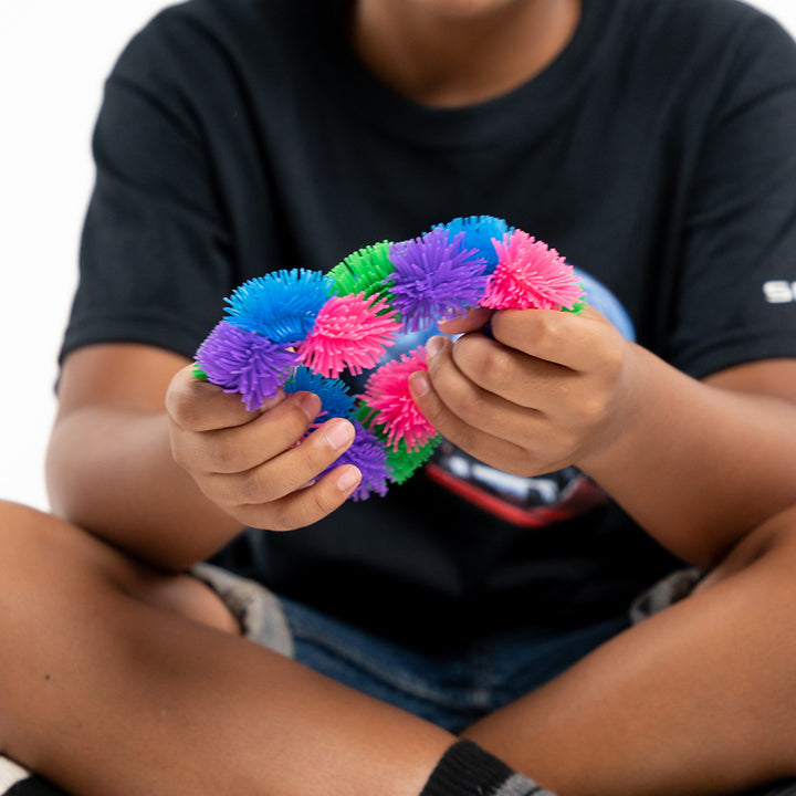 multicoloured, colourful, coloured tangle, toy, twist and turn, fidget, classroom concentrate, autism, autistic, aspergers, asperger's, adhd, toy, tangle toy, care home, elderly, dementia, alzheimers, alzheimer's, nursing home, grandparents, gran, grandad