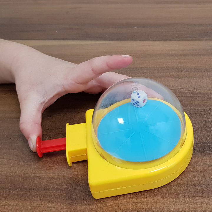 Push the plunger on the side of the domes to make the dice tumble. A valuable resource to prevent lost dice! Increase your game night efficiency and keep your dice safe with the Mini Dice Dome. Each time you push the plunger on the side of the dome, you'l