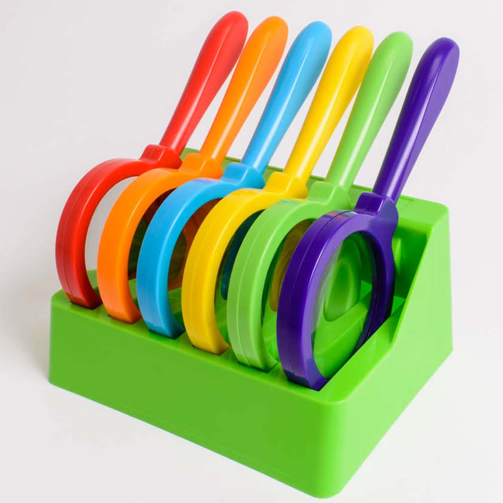 Set of six brightly colored, extra-large hand-held magnifying glasses with 3x magnification. Includes a convenient stand for safe storage when not in use. Perfectly sized for small hands, ideal for exploring plants, animals, and insects in life science le