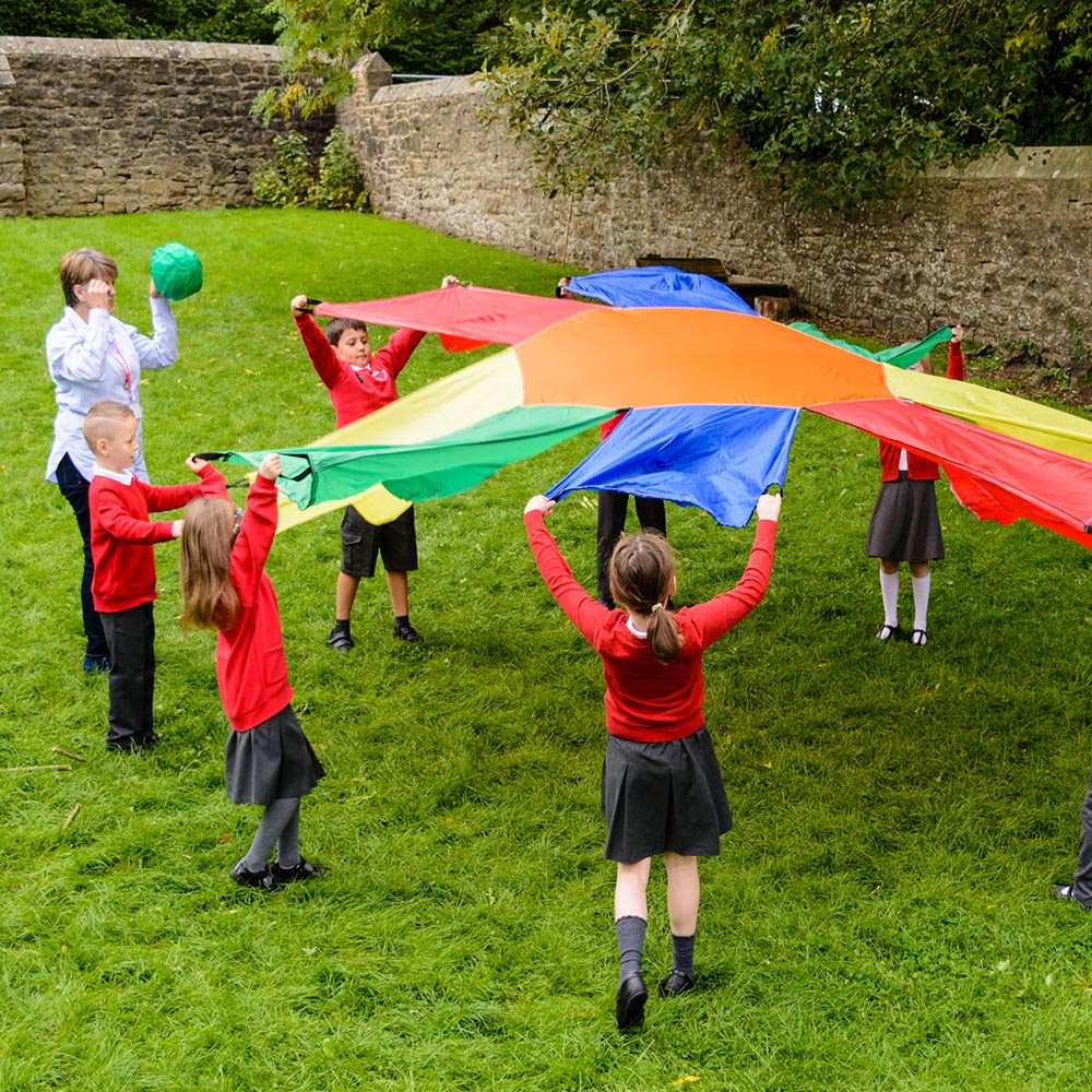 indoor play, outdoor play, play activity, group activity, sensory, early years, kids, children, infants, active, schools, giant sunflower colourful parachute with hand holes and ball, educational resources, educational supplies, educational products, school supplies, school resources, PE, physical education, teaching resources, teaching supplies